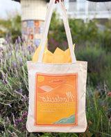 Montecito Canvas Tote in garden setting 